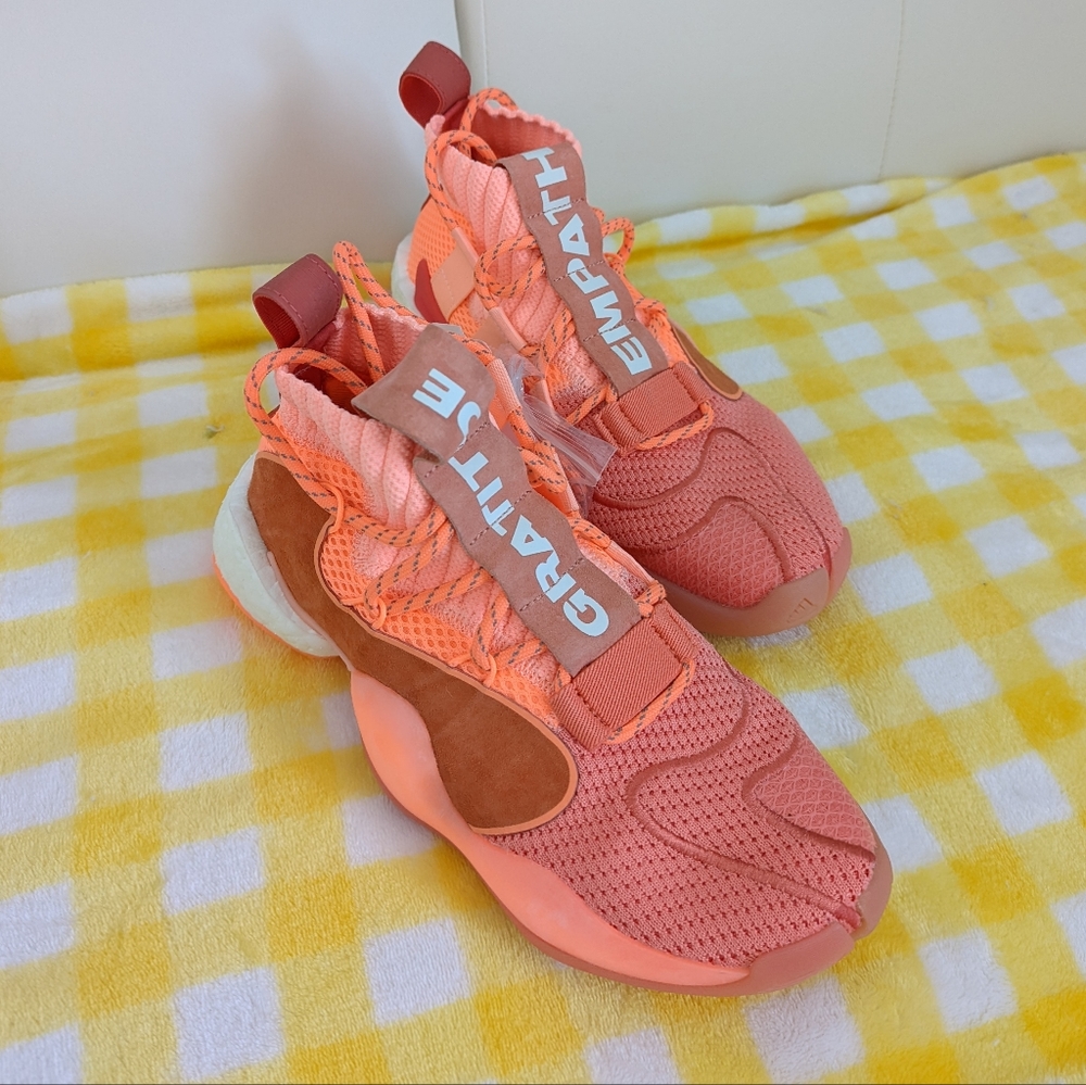 Pharrell x Adidas 'NMD Hu' orange high top sneakers